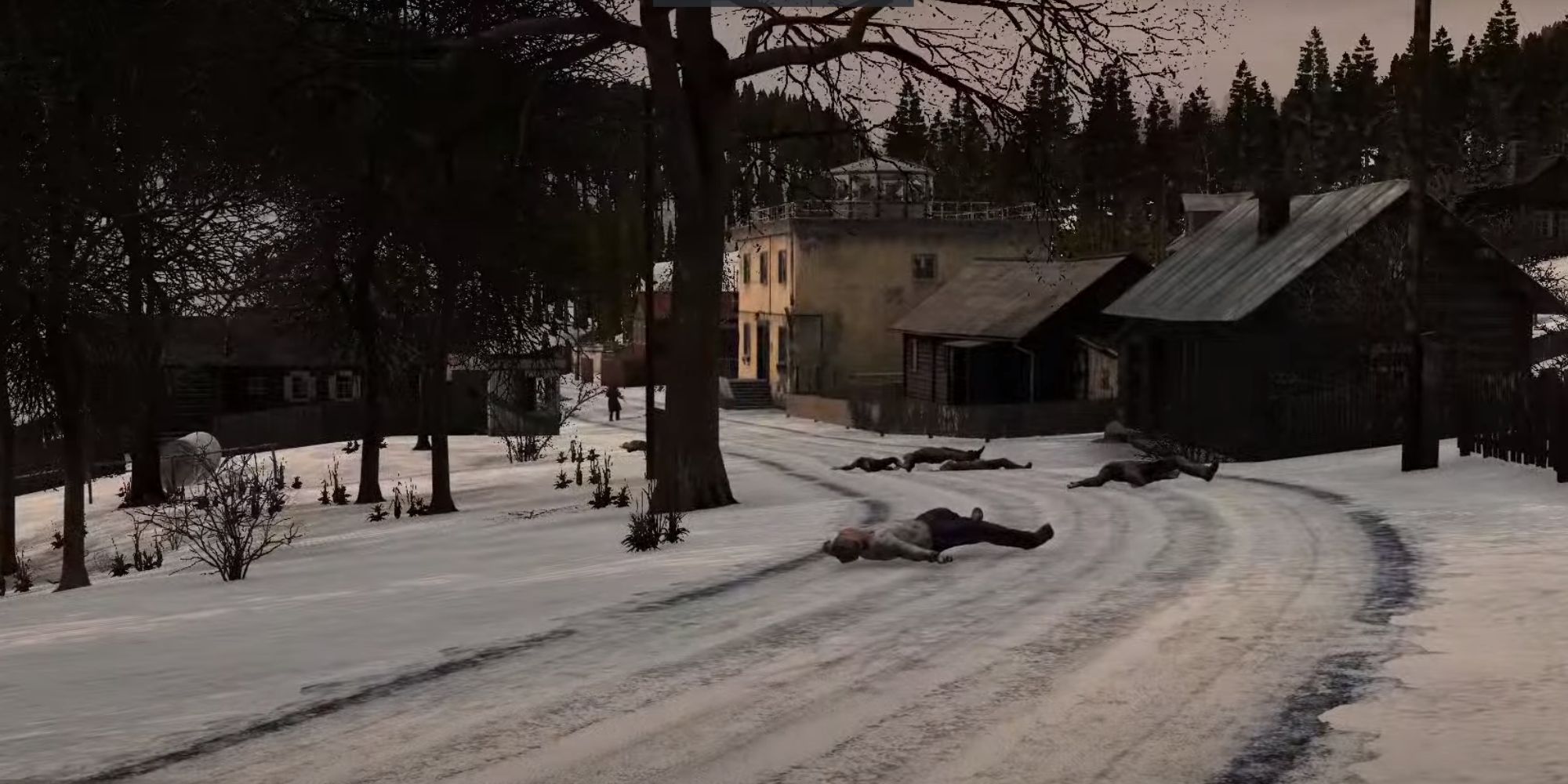 A snowy town in Dayz with multiple buildings and bodies strewn across the main road.