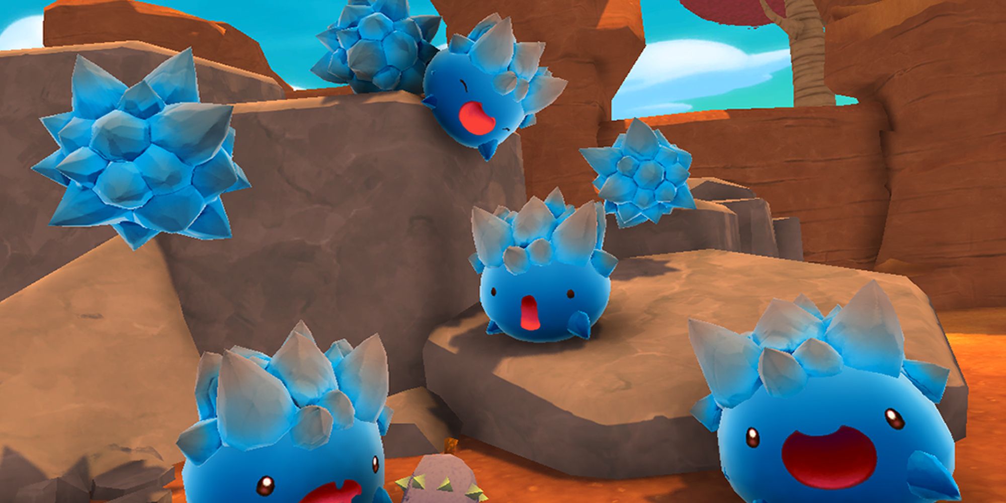 A group of Rock Slimes in Slime Rancher.