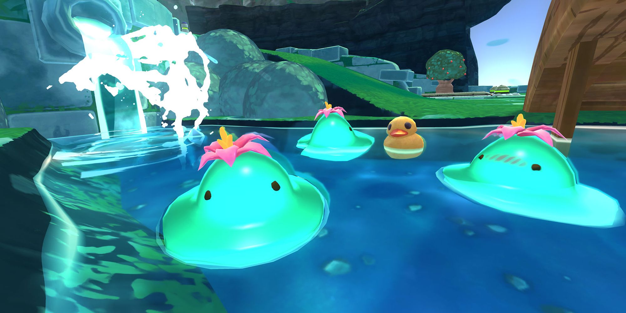 A group of slimes in the water in Slime Rancher.