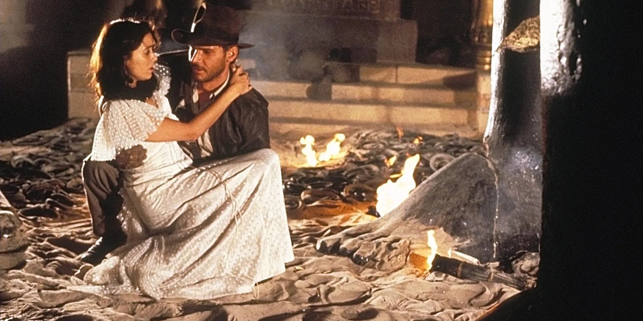 Indiana Jones and The Raiders of The Lost Ark: Indy and Marion inside a snake filled tomb.