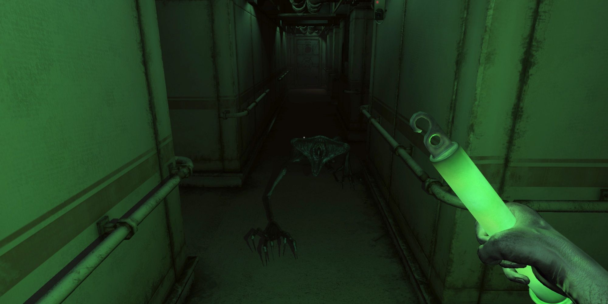 Monstrum screenshot showing a ship corridor lit by a glowstick with a strange creature crawling across the floor toward the player.