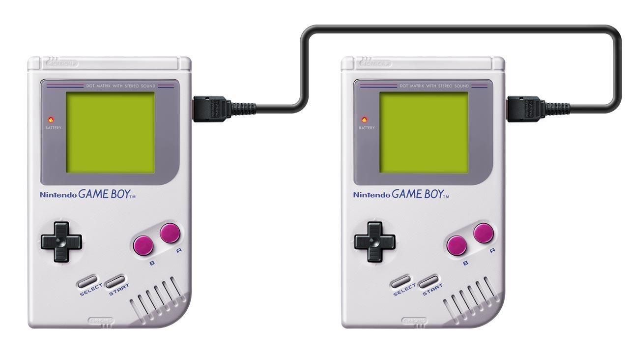 Two Game Boys linked by a Game Link cable.