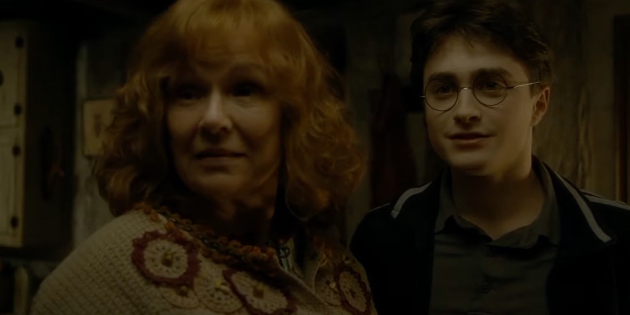 Harry Potter next to Mrs Weasley.