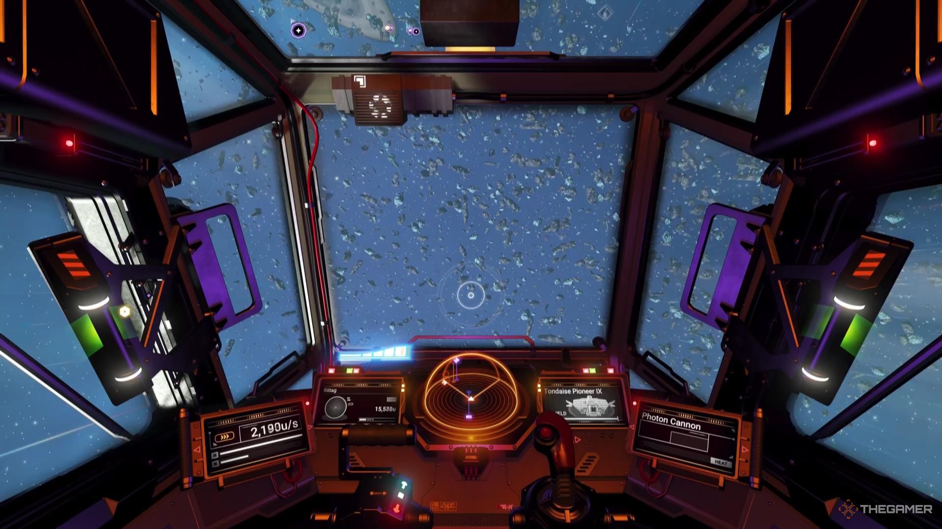 An asteroid field seen through a cockpit windshield in No Man's Sky.