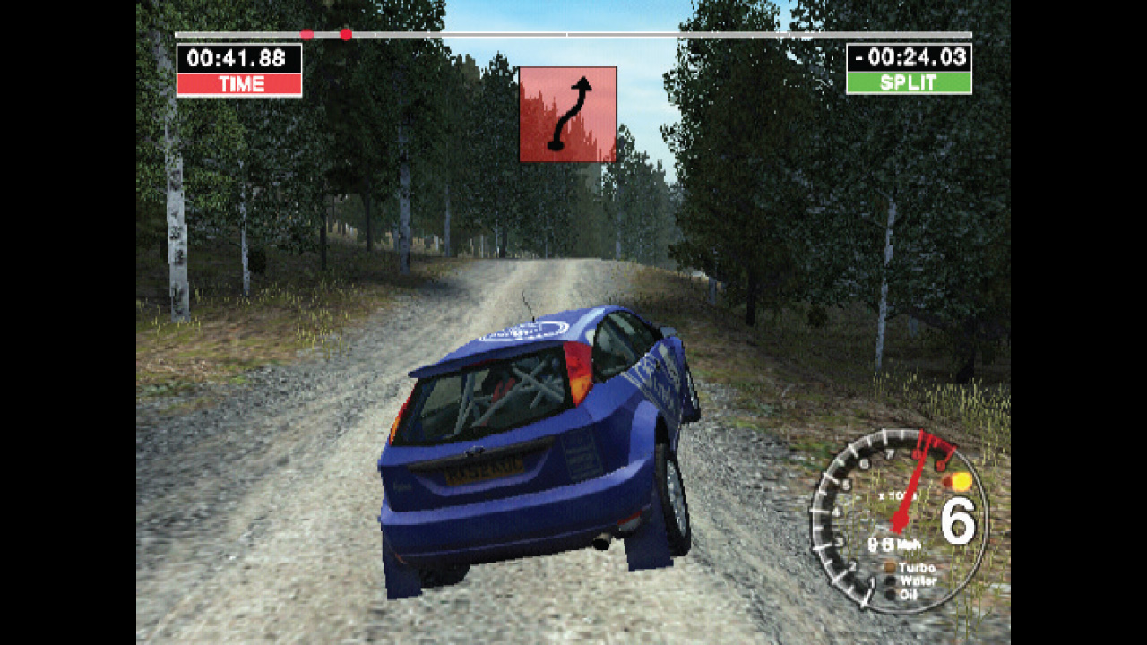 The car takes to the air before a dangerous chicane in Colin McCrae Rally 04 on PS2