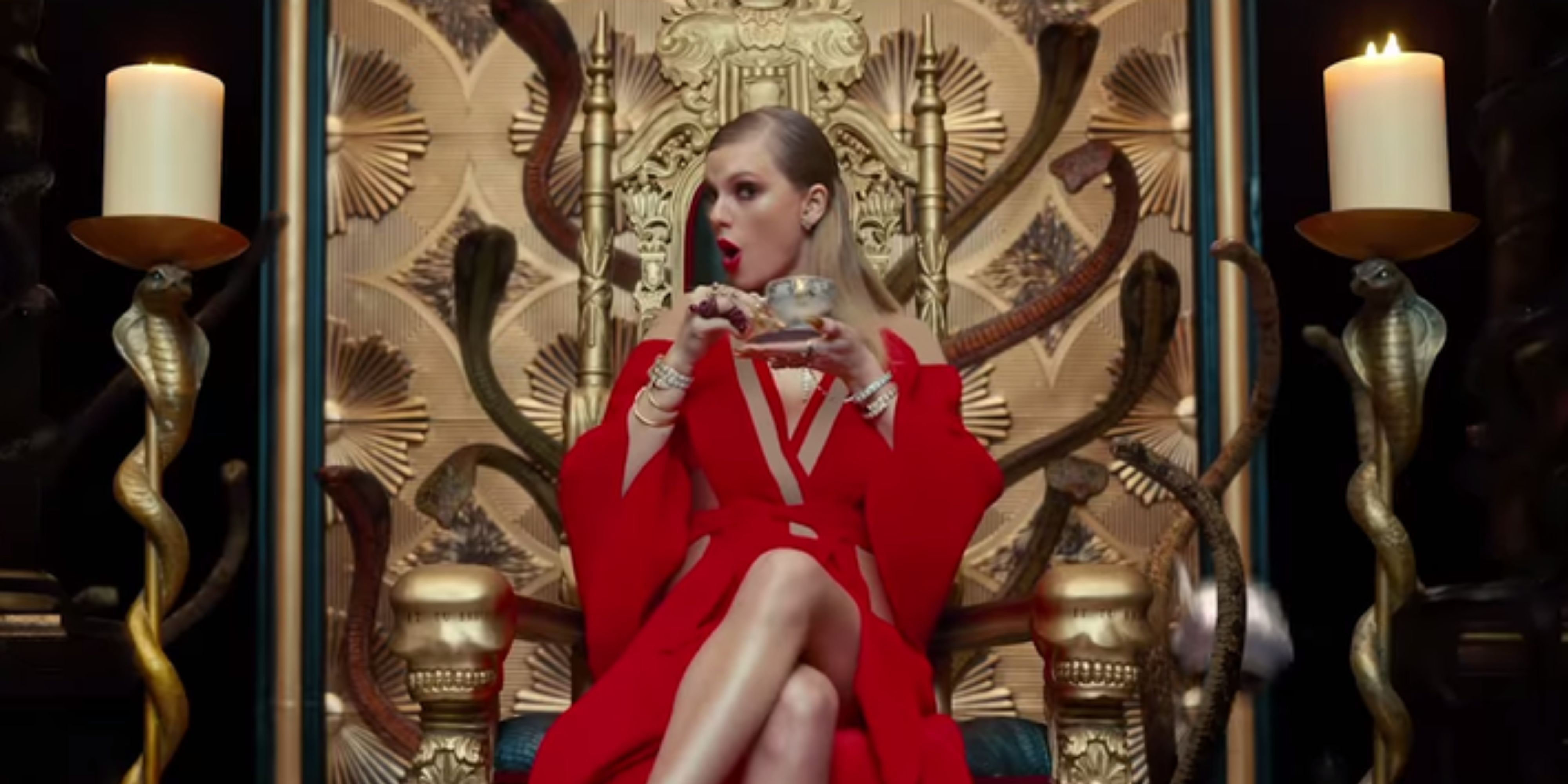 Taylor Swift on a throne of snakes