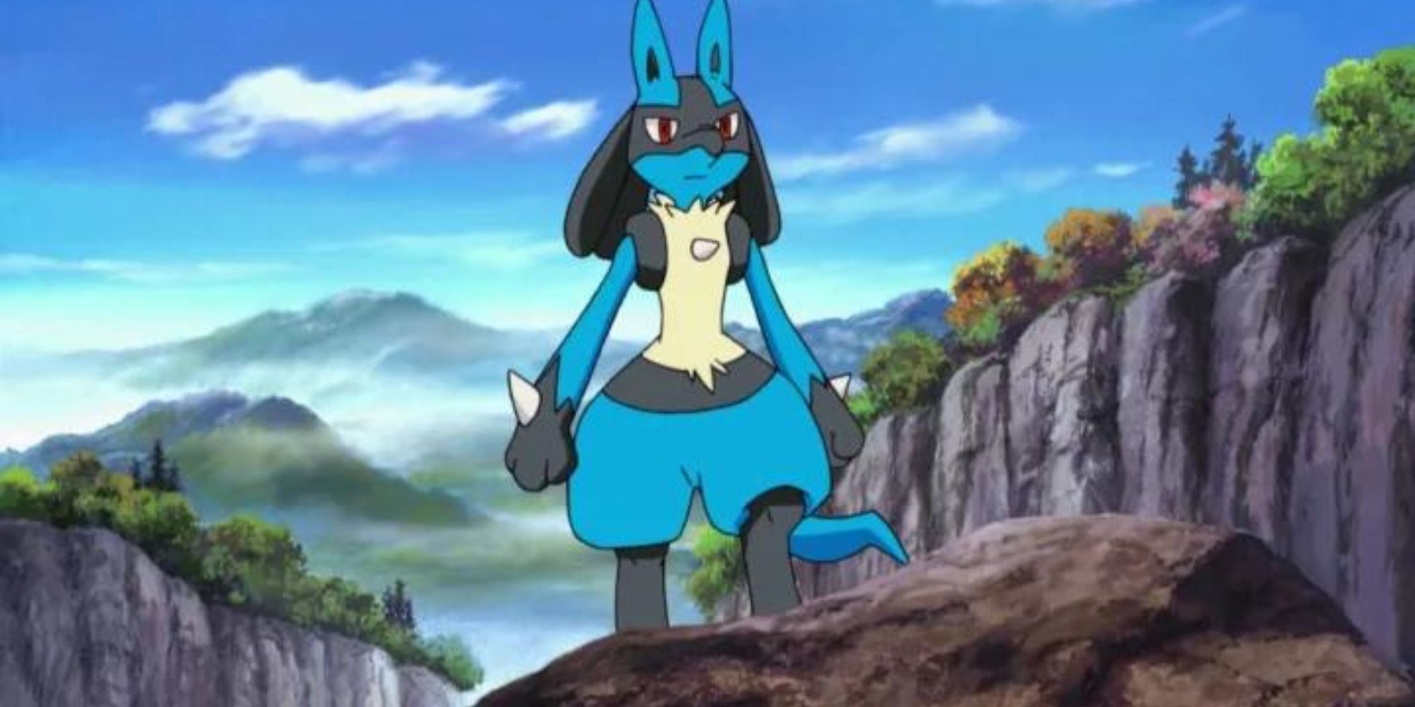 Pokmeon: Lucario stands on a rock by some mountains in the Pokemon anime.