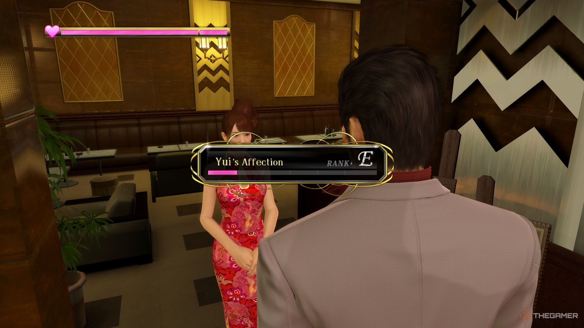 Yakuza Kiwami screenshot of Kiryu looking at Yui with her affection meter on the screen.