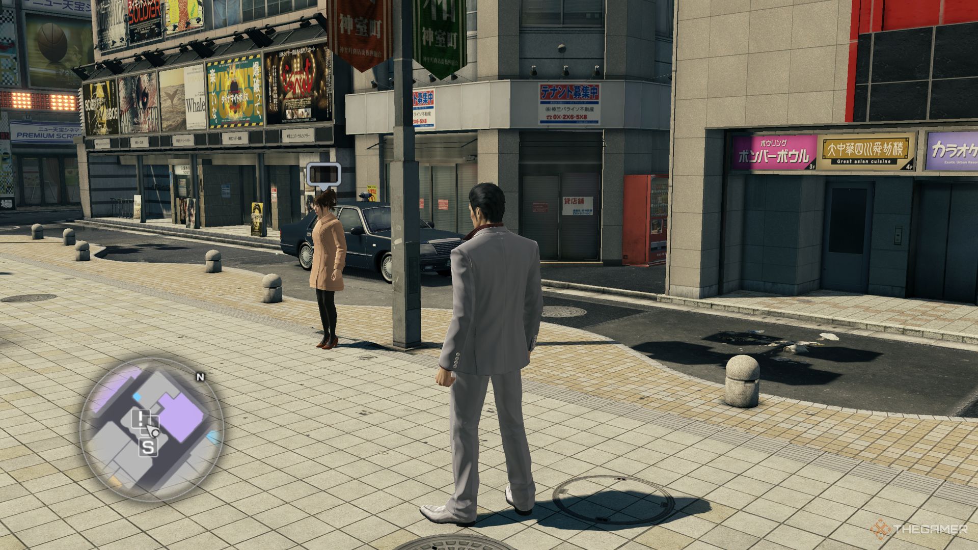 Yakuza Kiwami screenshot Kiryu looking at Yui, who is stood next to a post.