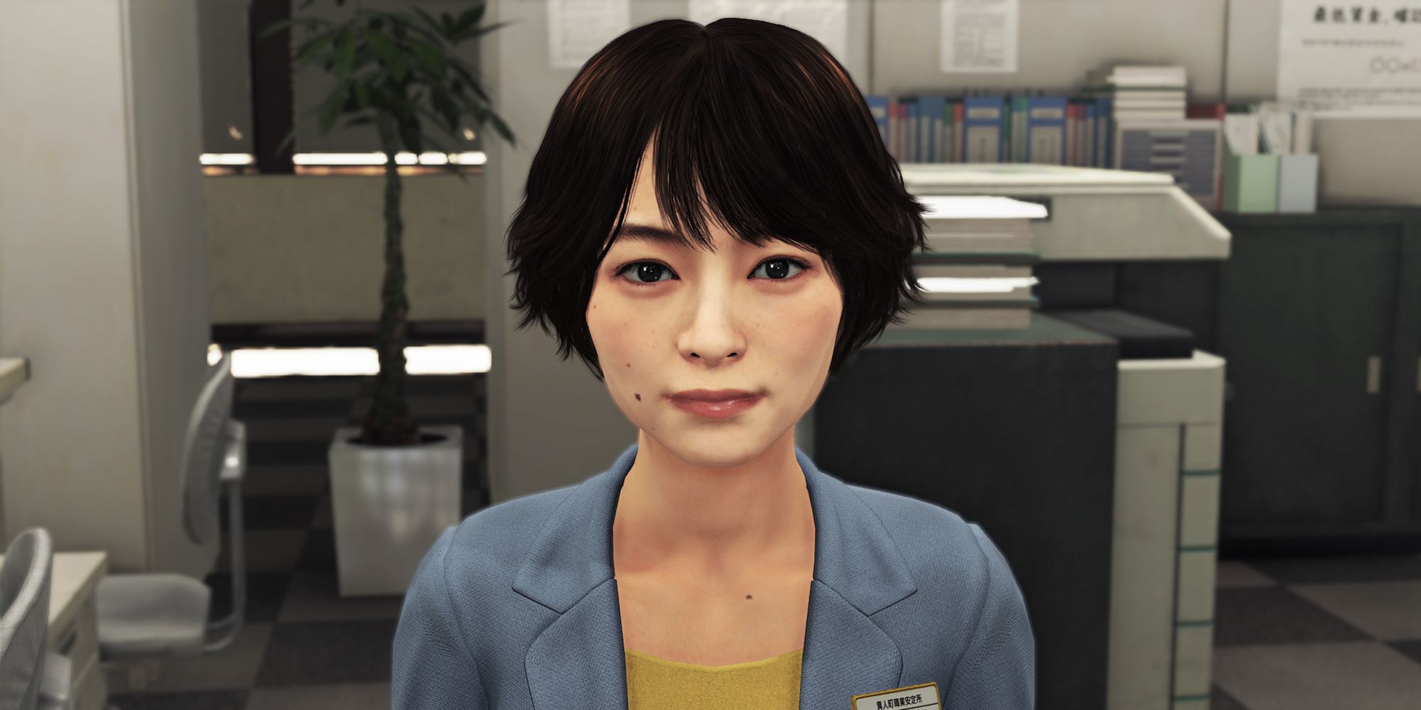 Ririka sits in Hello Work in Yakuza: Like A Dragon.