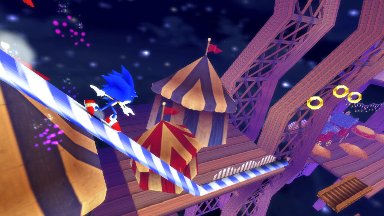 Sonic grinds down a rail in a carnival level in Sonic Rivals