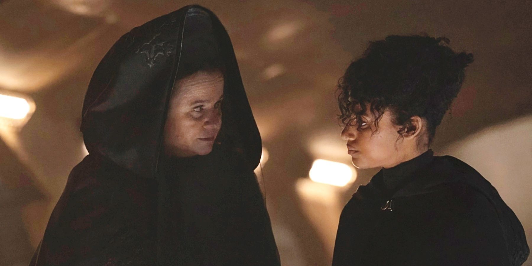 Valya Harkonnen (Emily Watson) meets with her spy Mikaela (Shalom Brune Franklin) in Dune: Prophecy