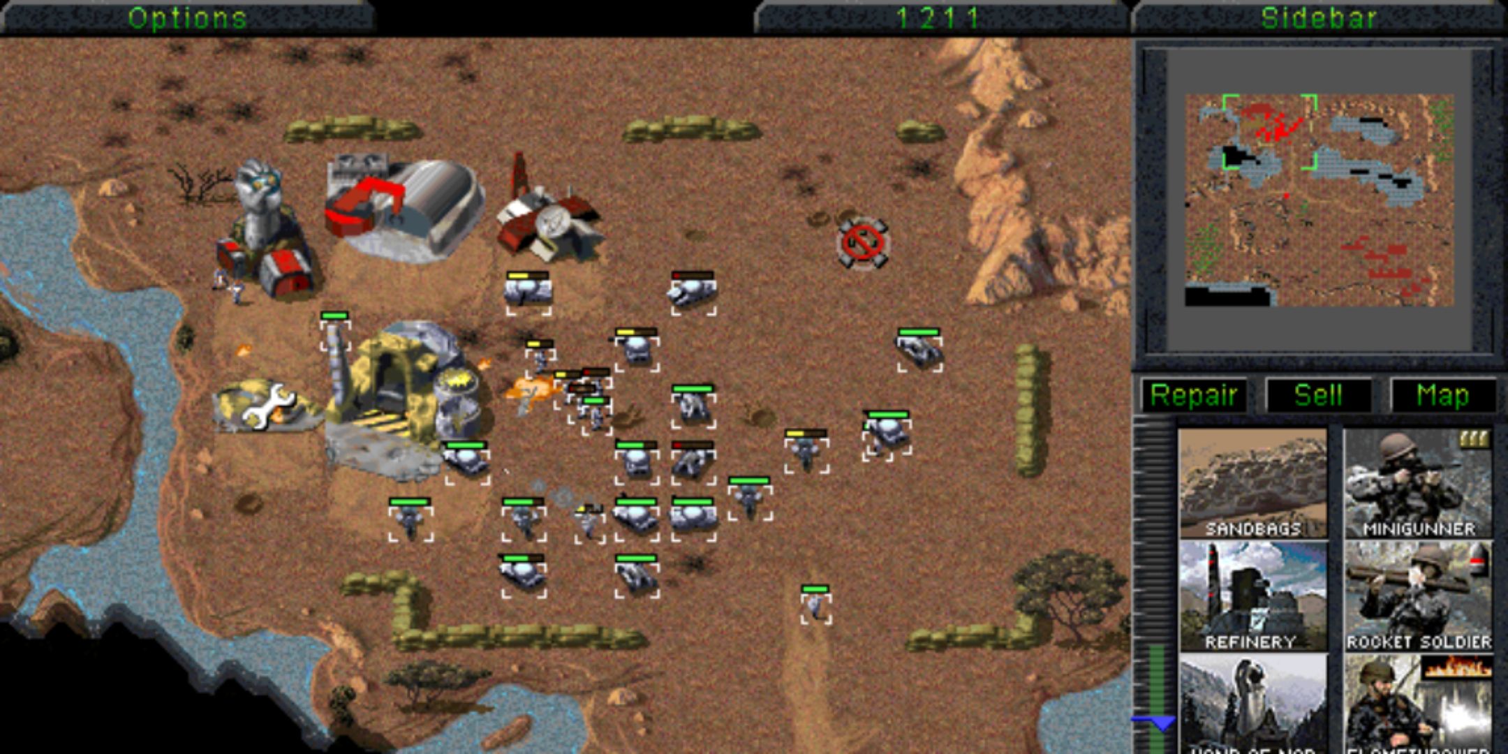 Command And Conquer 1995 screenshot of enemies attacking a refinery.