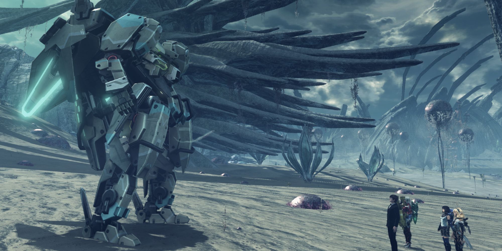 A group of young people standing in front of a mech on a desert land in Xenoblade Chronicles X.