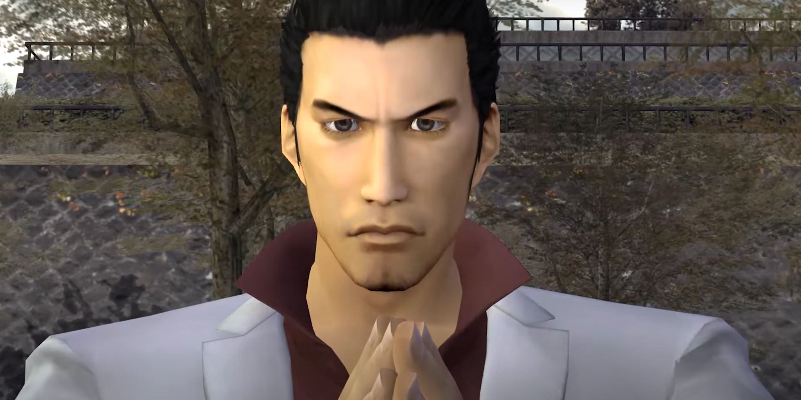 A close-up of Kazuma praying in Yakuza 2.