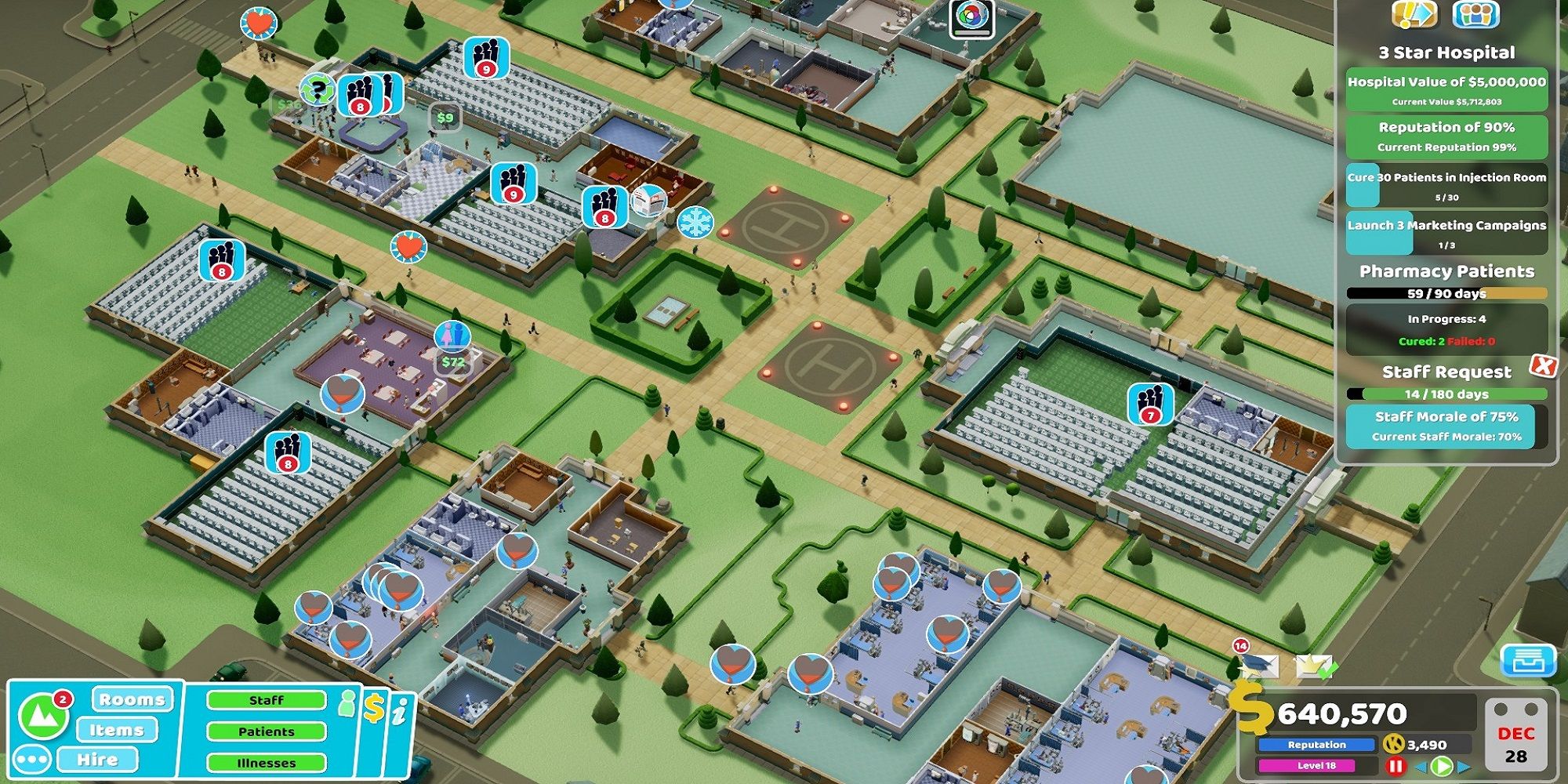 Two Point Hospital screenshot overview of hospital consisting of multiple buildings.