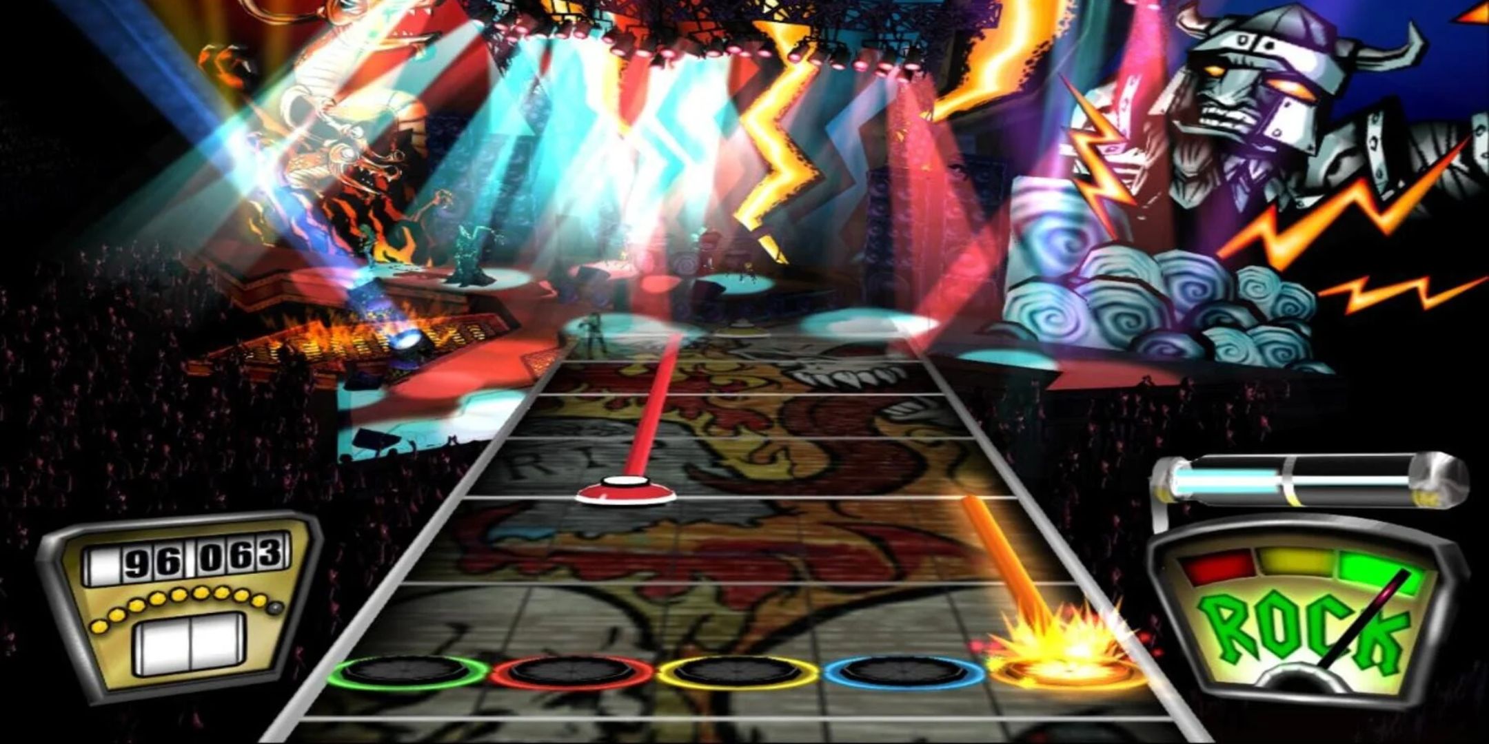 Guitar Hero screenshot of gameplay with notes going across a board.