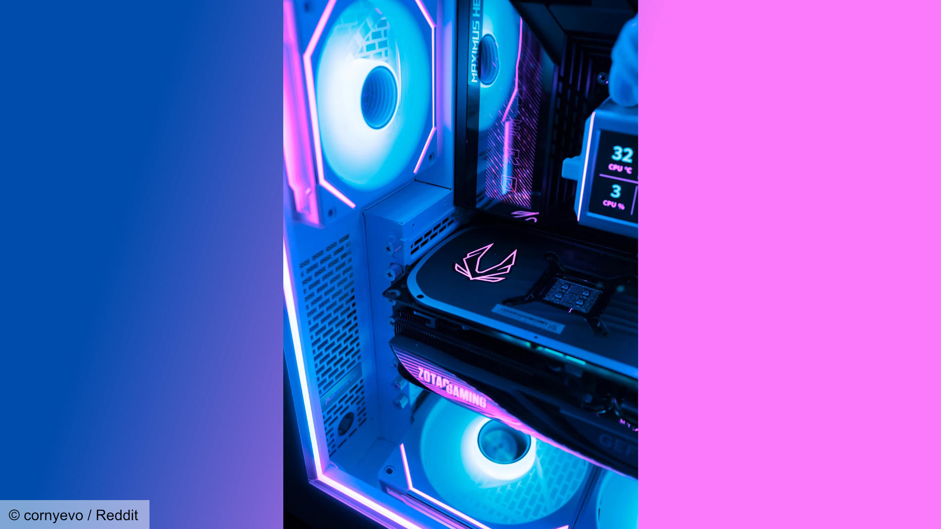 The internals of the Tron-like gaming PC with fans and color scheme.