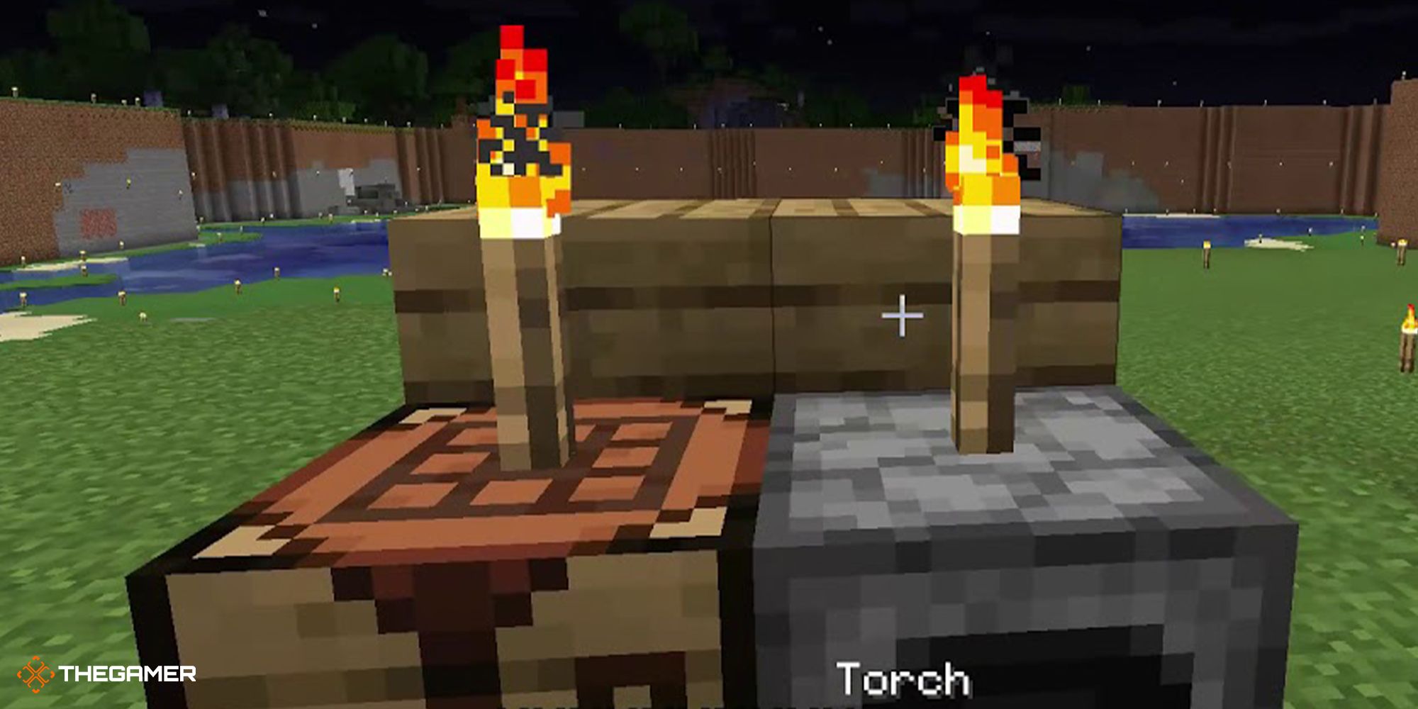 Torches on top of a Furnace and a Crafting Table.