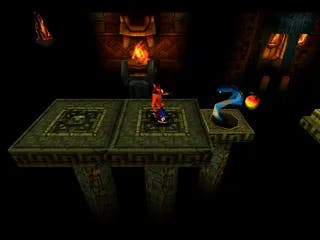 Crash Bandicoot screenshot showing crash in a sideways-scrolling platforming level in a tomb