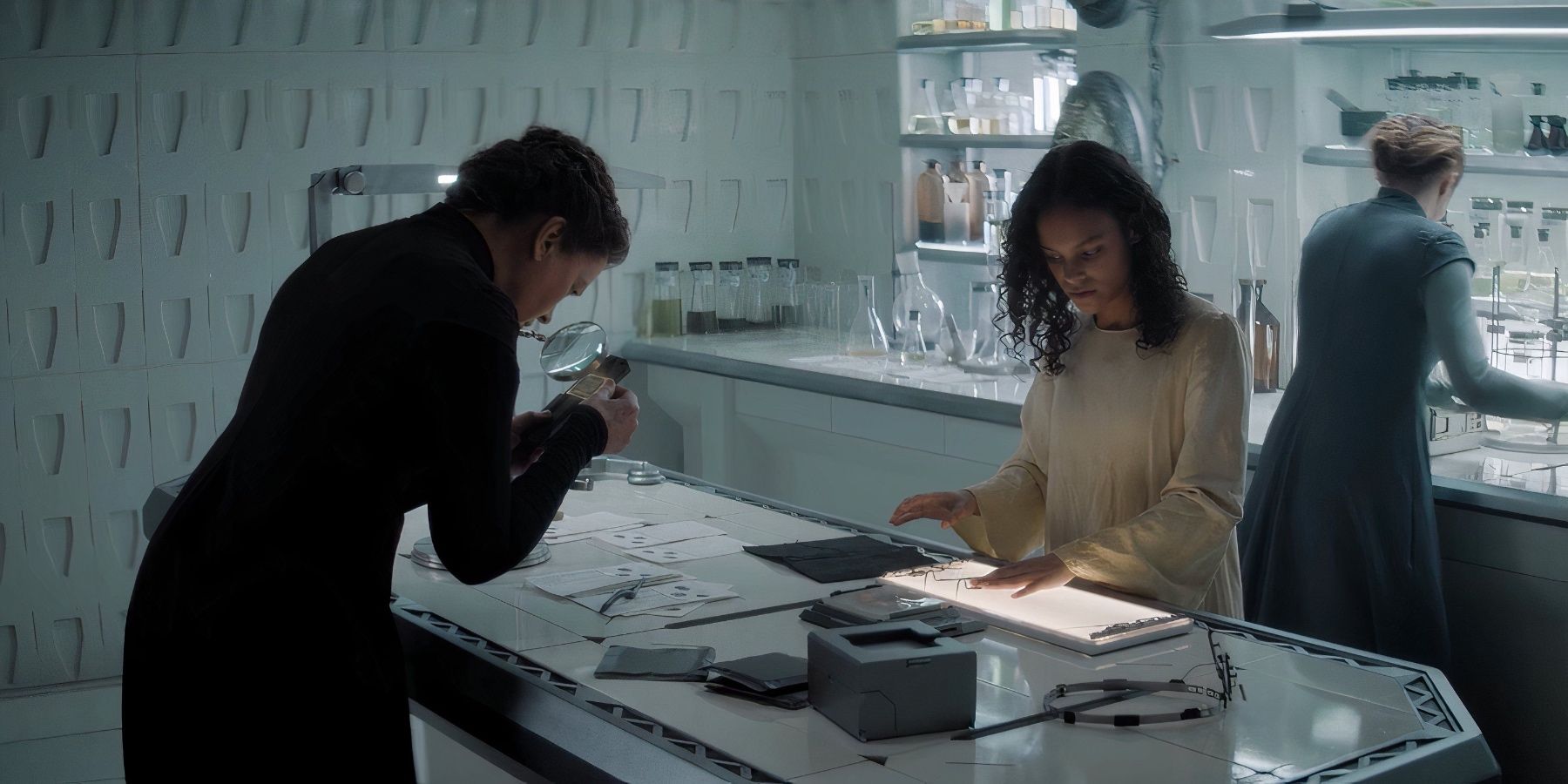 Tula, Lila, and Jen work in the lab in Dune: Prophecy