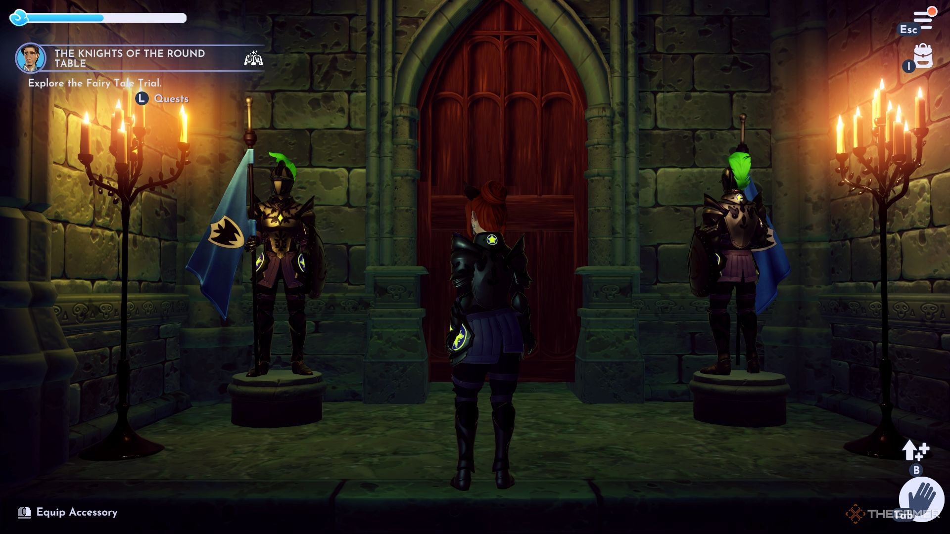 The avatar facing a locked door with two suits of armor.