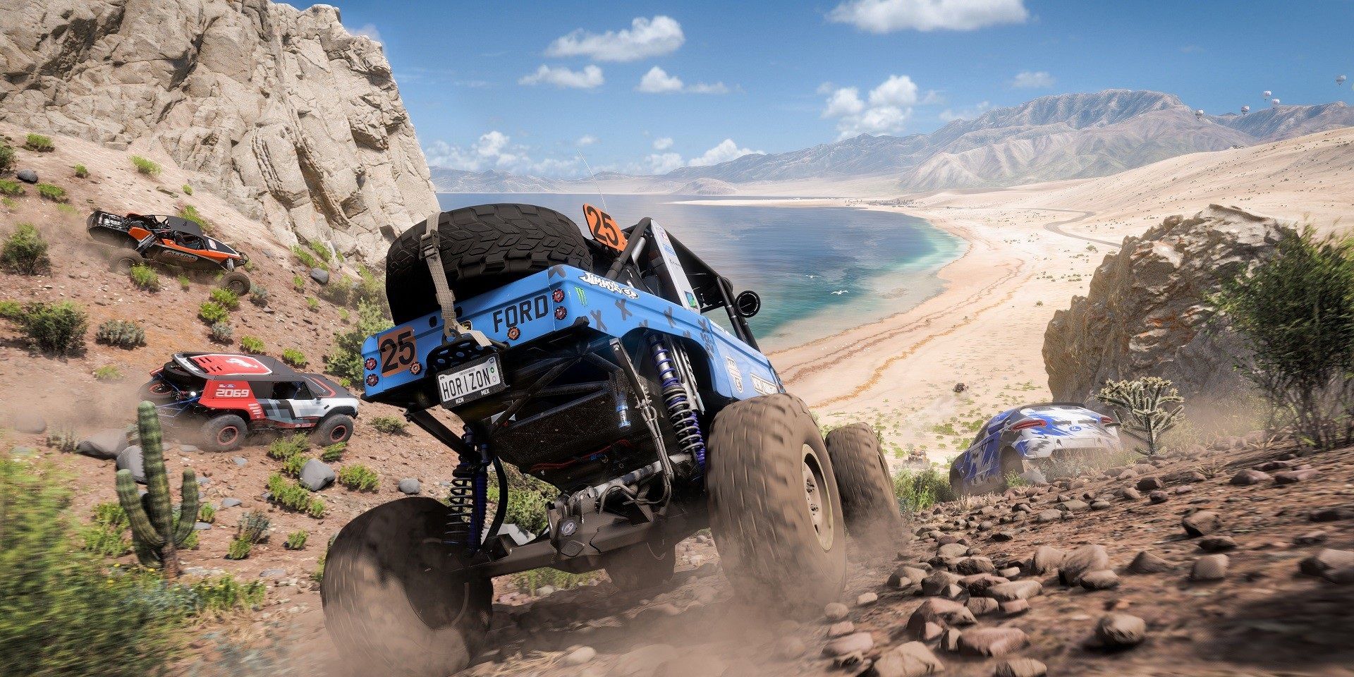 Car driving on a dirt road to the beach