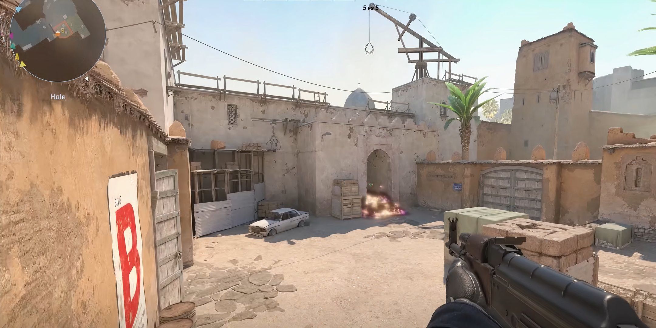 Player with an AK-47 holding B tunnels on the Dust 2 map in Counter-Strike 2.