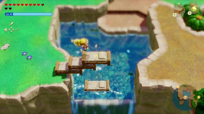 Princess Zelda crosses a large river by piling beds on top of one another in The Legend of Zelda: Echoes of Wisdom.