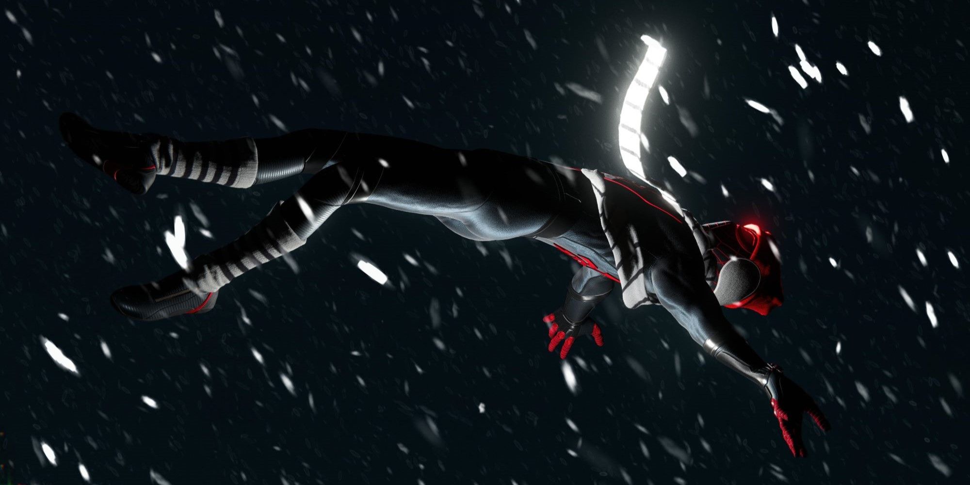 Marvel's Spider-Man Miles Morales, Miles falling through the snow in his ear mits and scarf