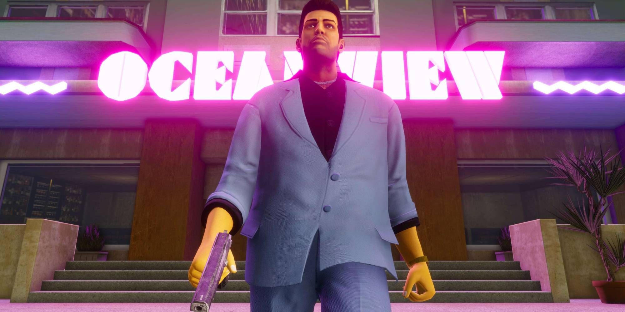 Tommy Vercetti from Vice City walking in front of neon sign