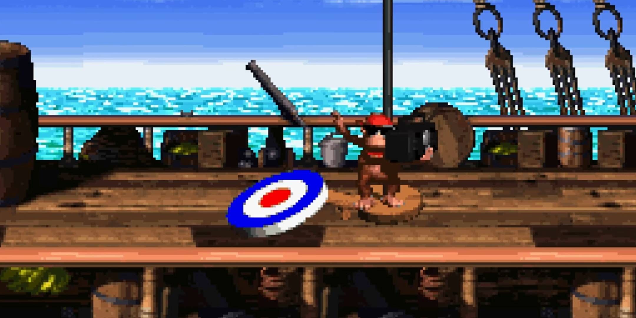 Diddy Kong dancing with sunglasses and a boom box at the end of a pirate ship level in Donkey Kong Country 2: Diddy's Kong Quest.