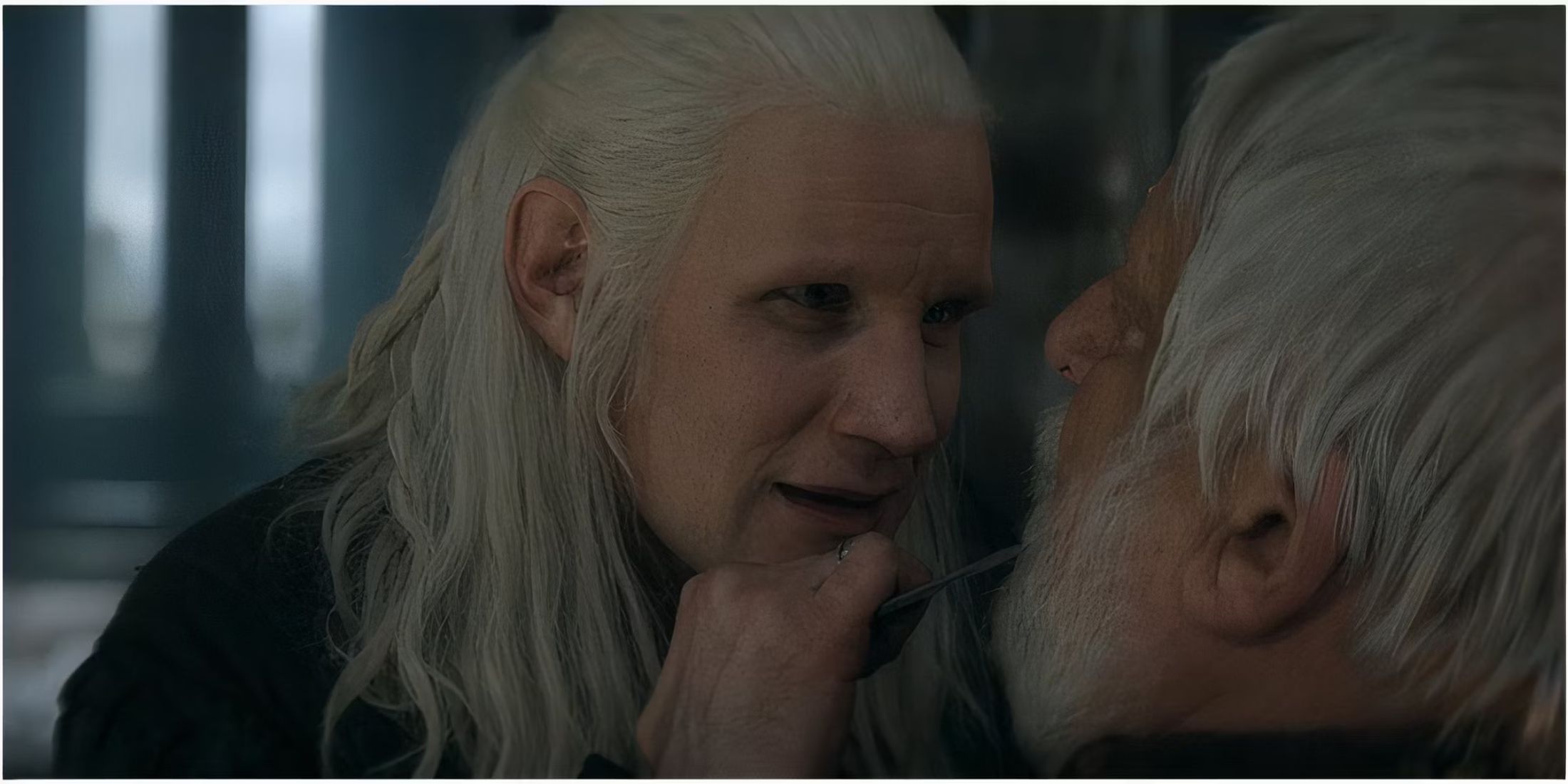 Daemon Targaryen holds a knife to Ser Simon Strong's throat in House of the Dragon