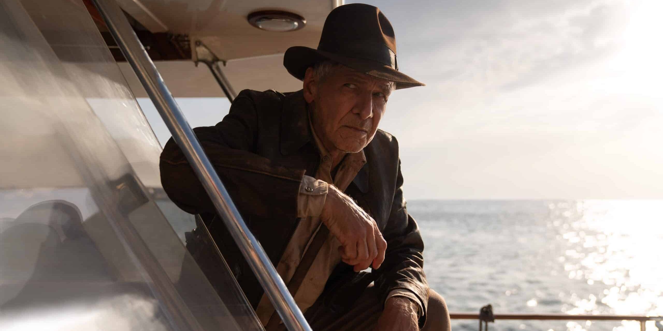 Indiana Jones and the Dial of Destiny: An elderly Indiana resting somewhere out at sea.