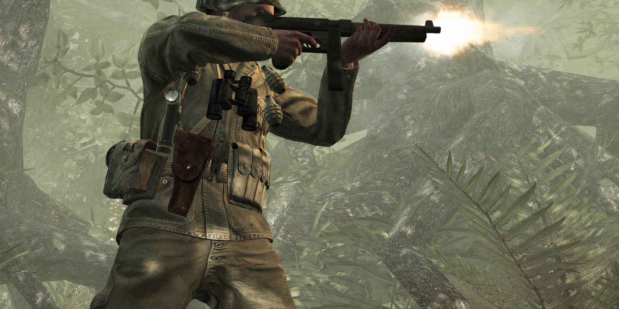 Soldier in Call of Duty: World at War shooting a tommy gun at the enemy.