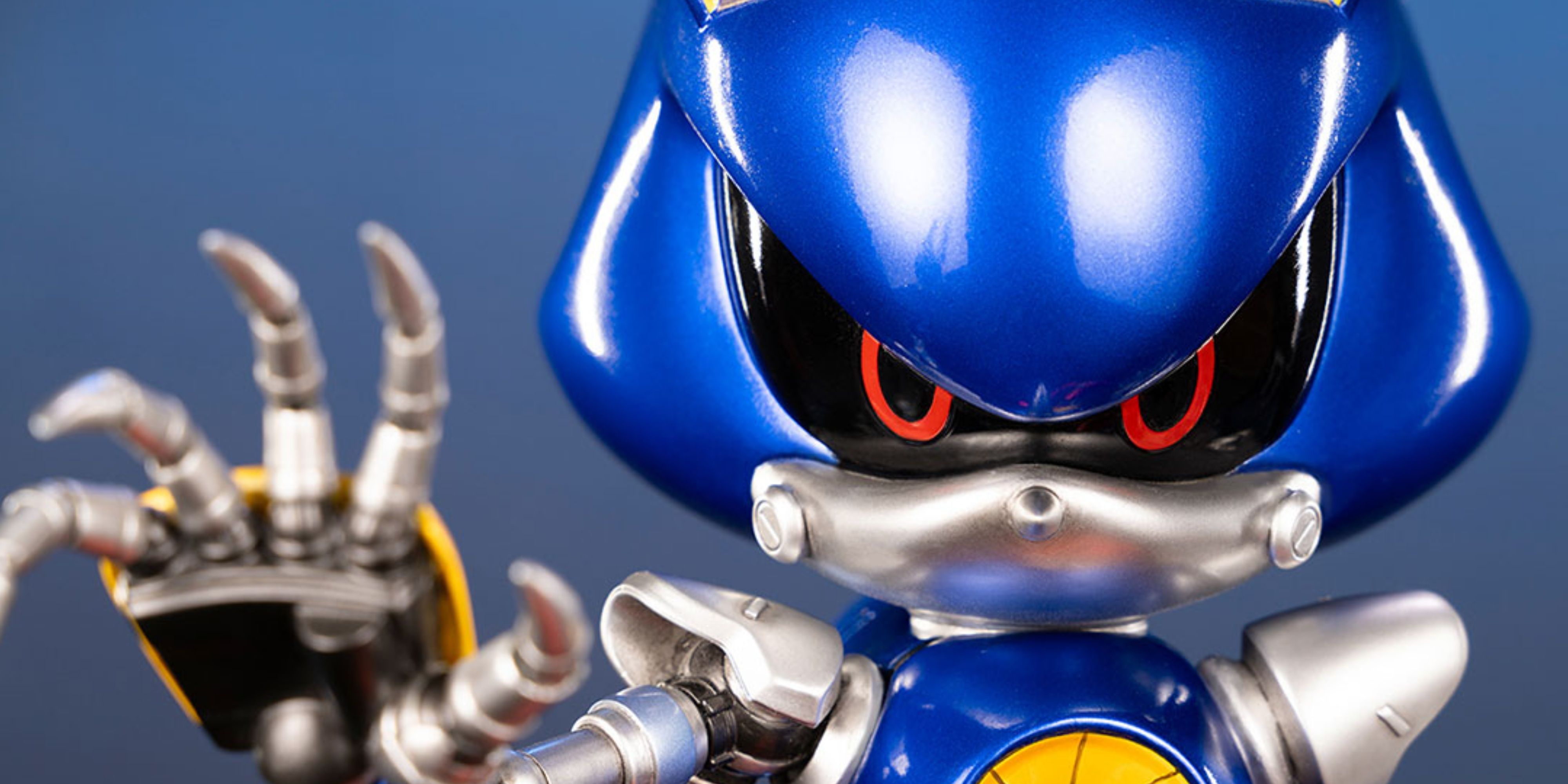 first 4 figures metal sonic statue reaching its hand towards the camera.