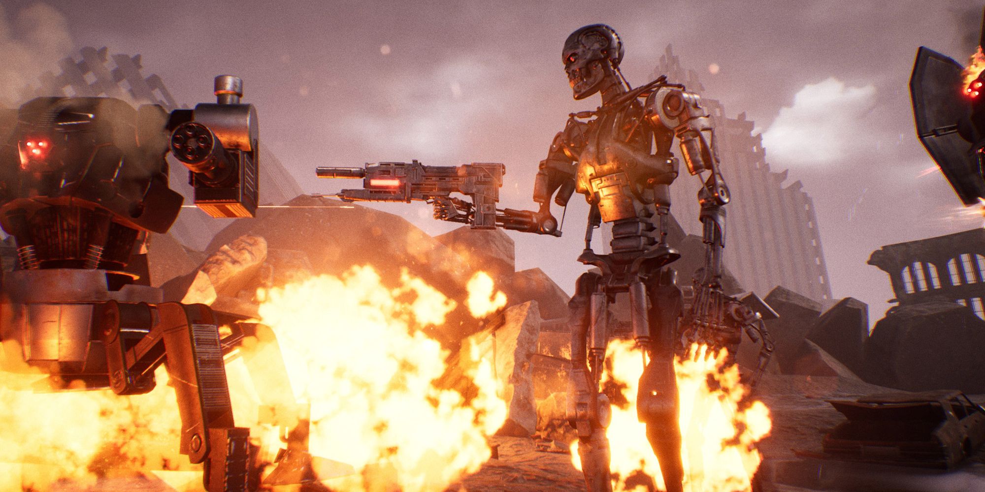 A Terminator robot stood pointing a gun in front of an explosion.