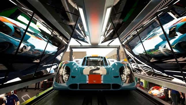 A race car sits in a showroom. 