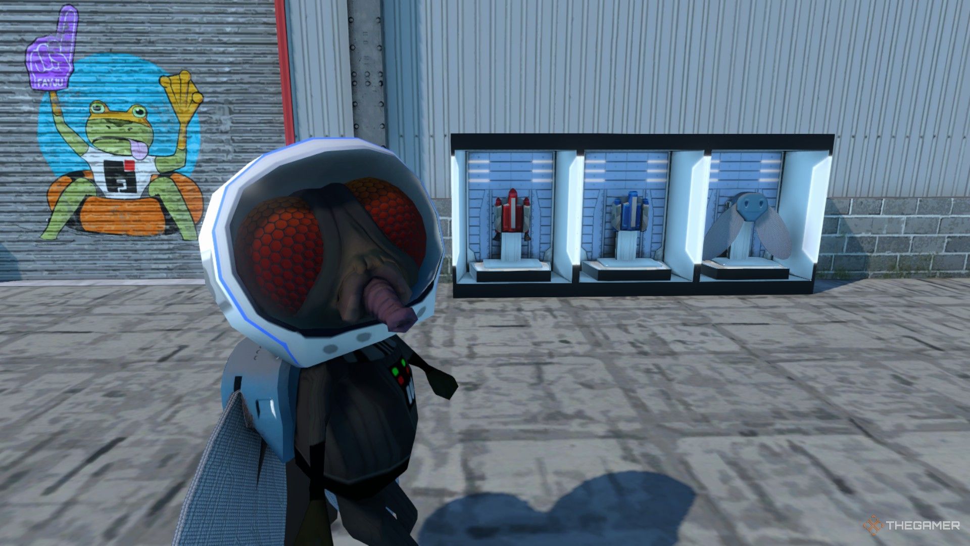 The player is wearing a space fly head and standing in front of the three dfiferent jetpacks in Amazing Frog.