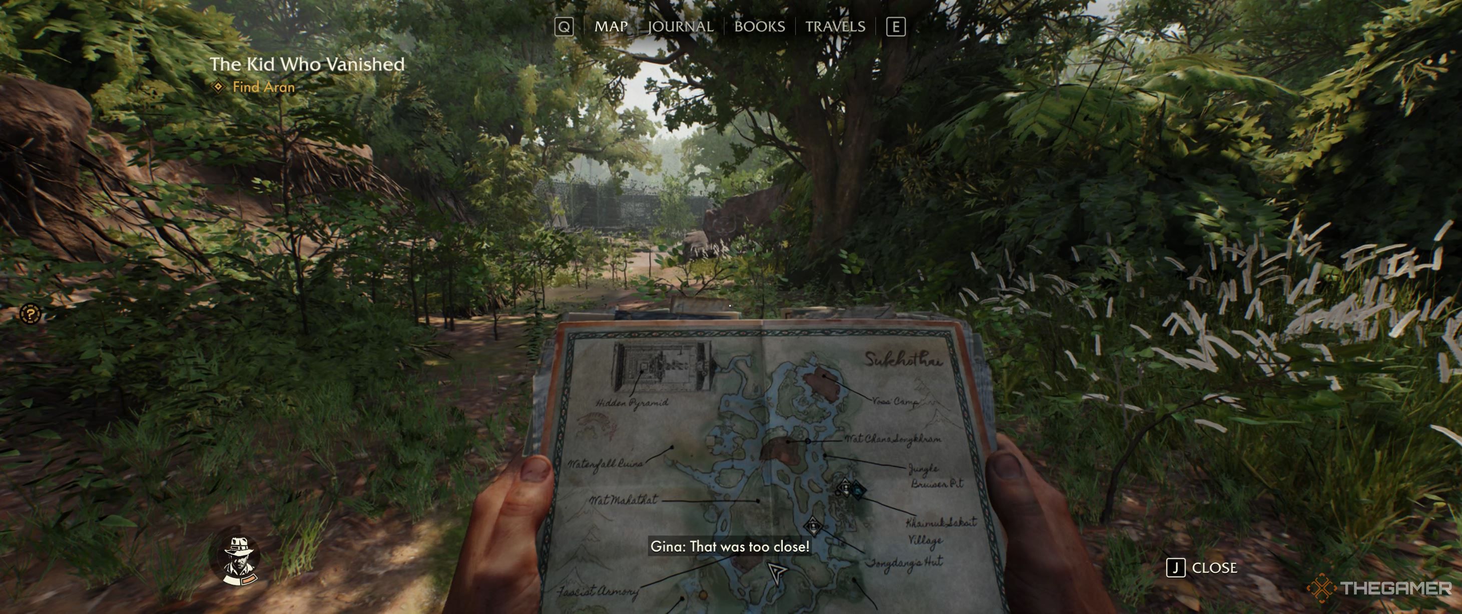 Indy looking at a map in front of the secret armory entrance.