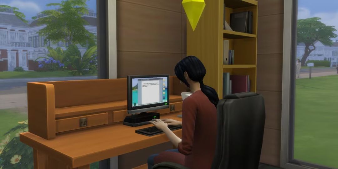 A Sim writes on a computer.