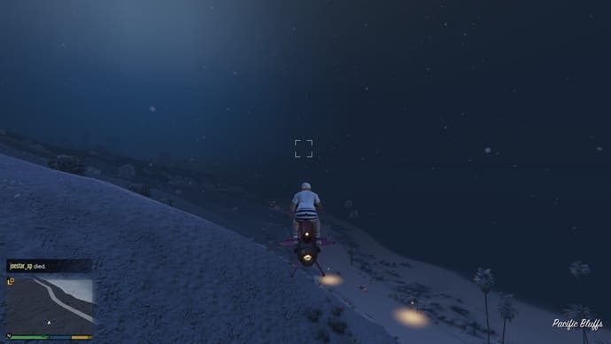 Flying over a wintry hillside in GTA Online.