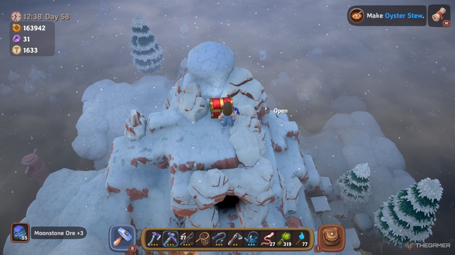 Player character standing next to a Red Chest at the peak of a snowy mountain in Luma Island.