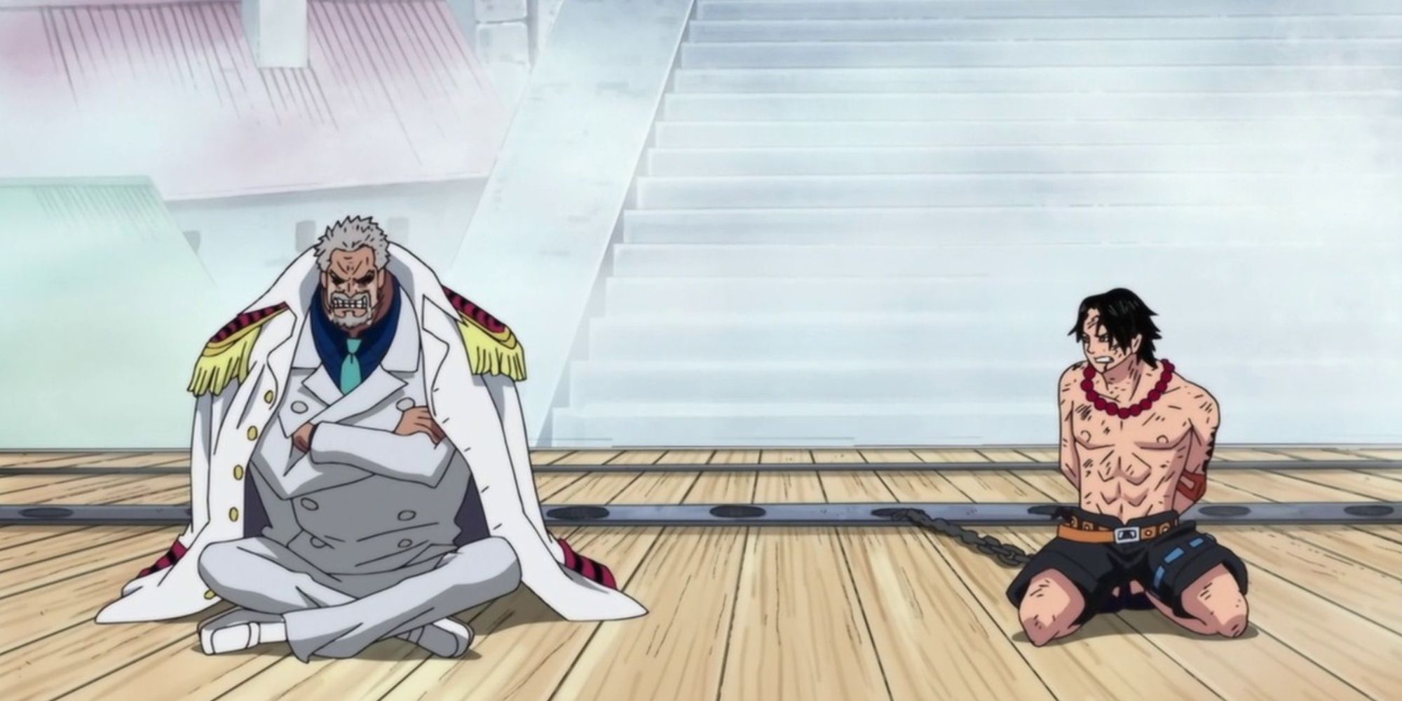 Garp looking frustrated, sitting on Ace's execution platform, as a chained Ace looks on pensively