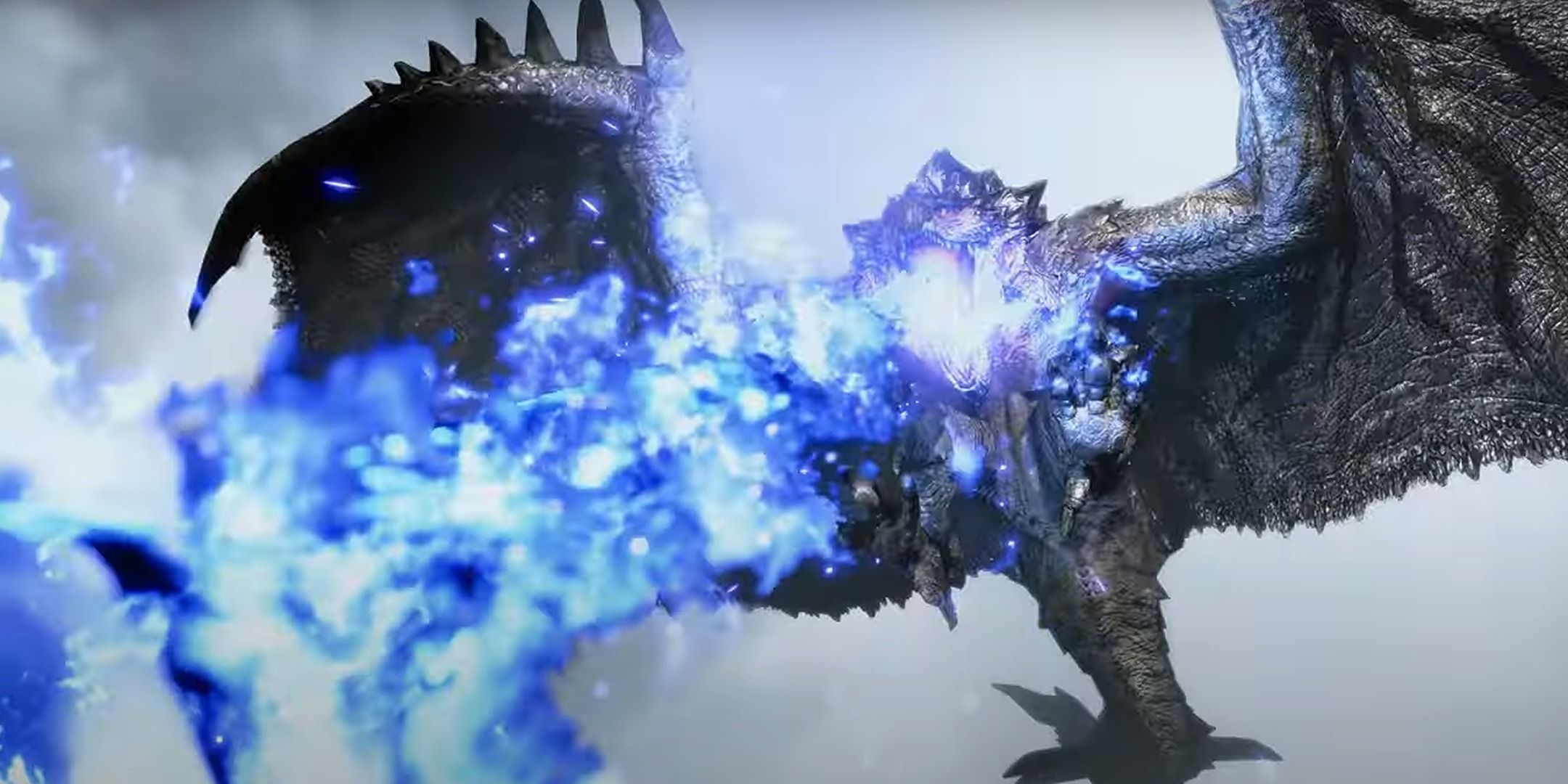 A Silver Rathalos blasting out Hellfire in Monster Hunter Rise: Sunbreak.