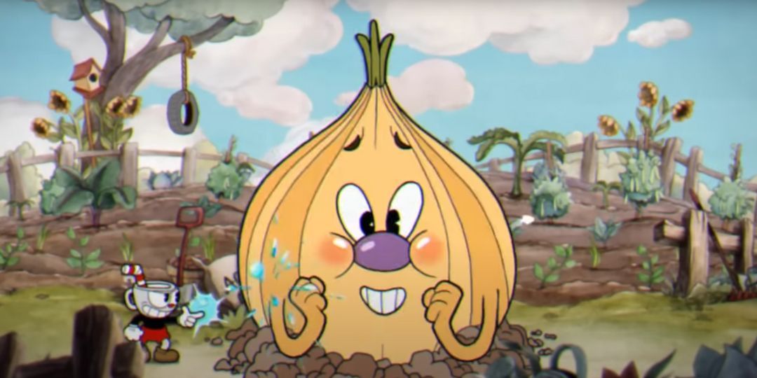 Cuphead fights a member of the Root Pack, a large onion.