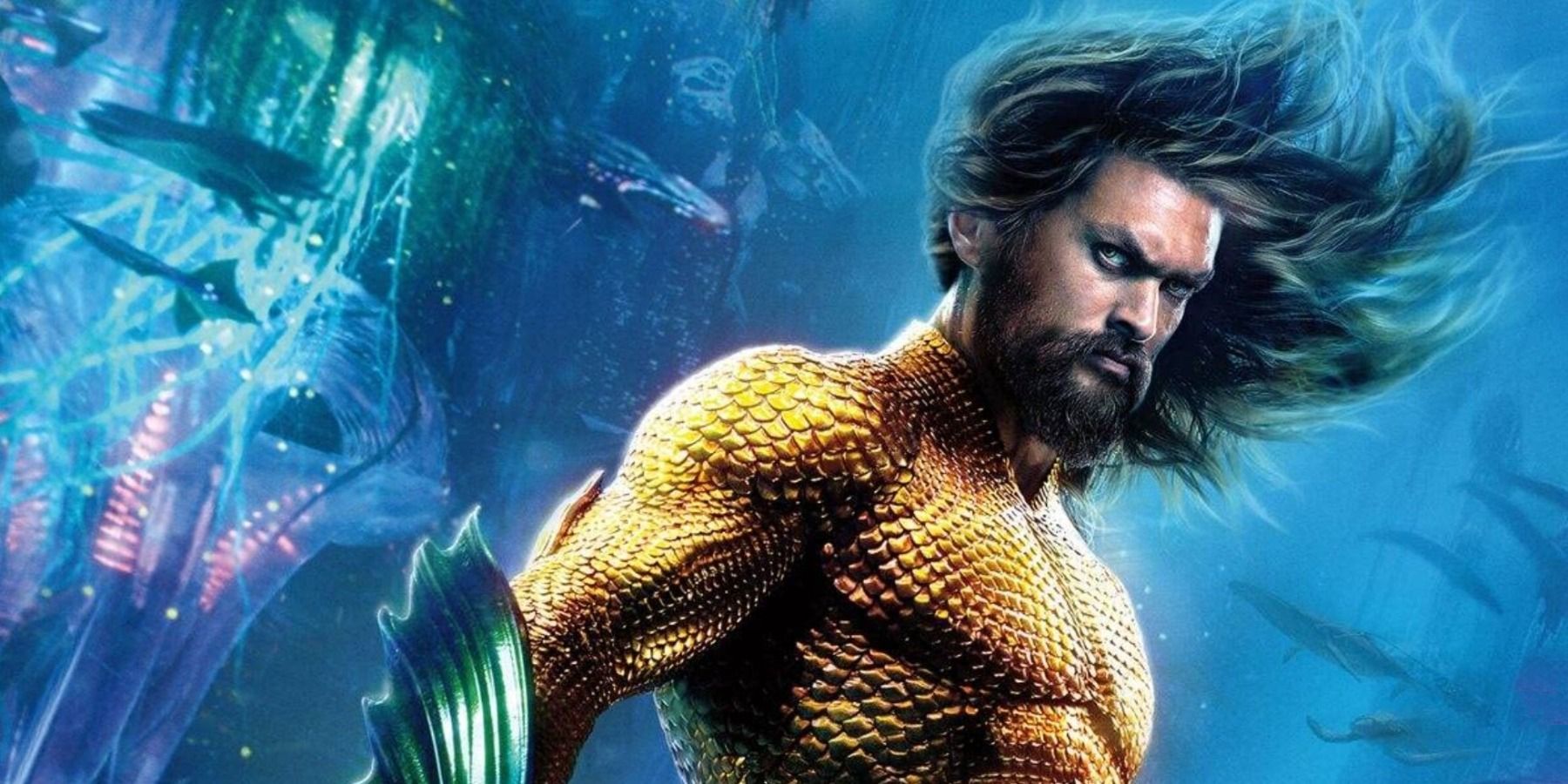 Jason Momoa under water as Aquaman side shot