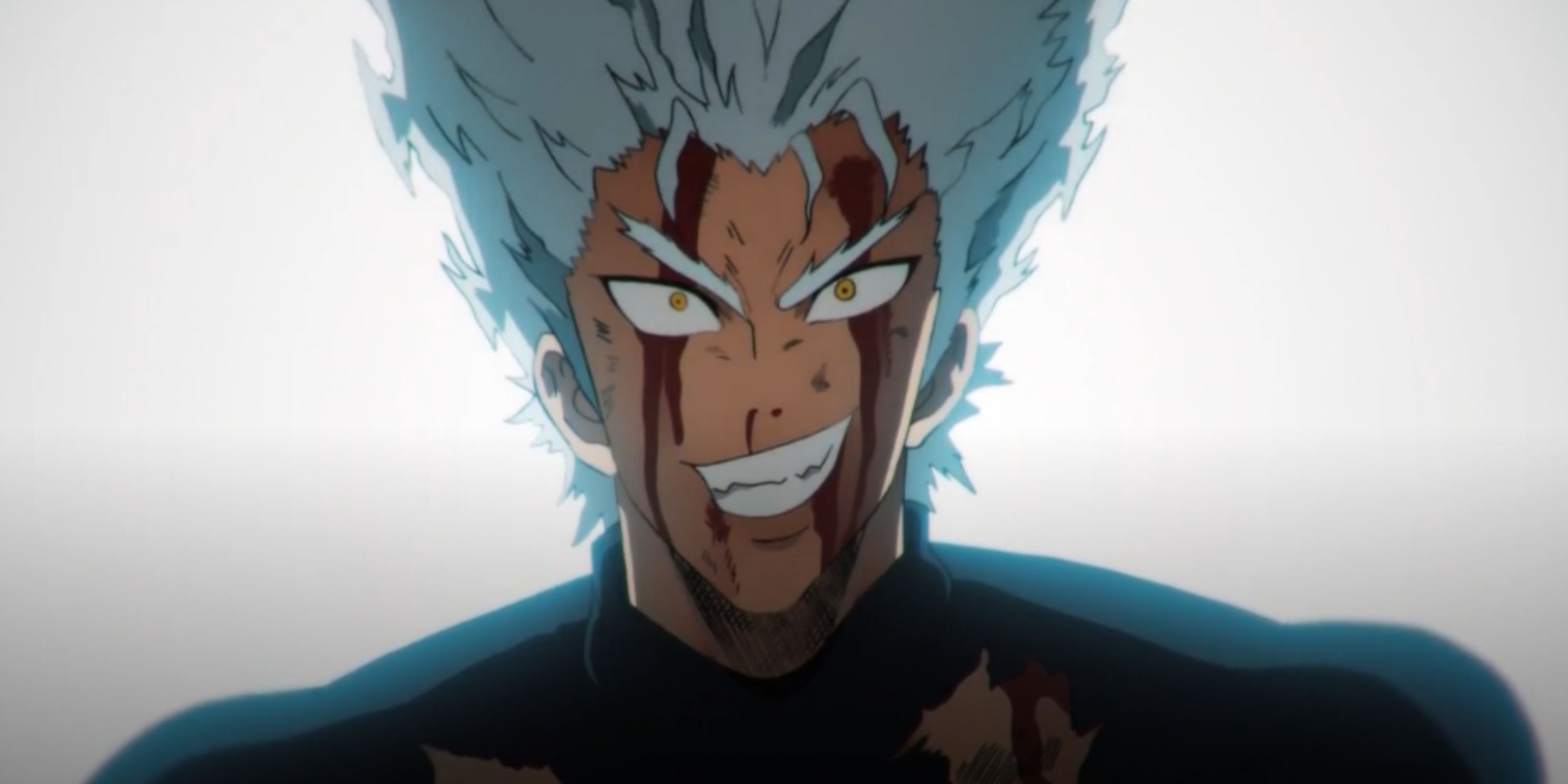 A bloody Garou grins in anticipation in One-Punch Man.