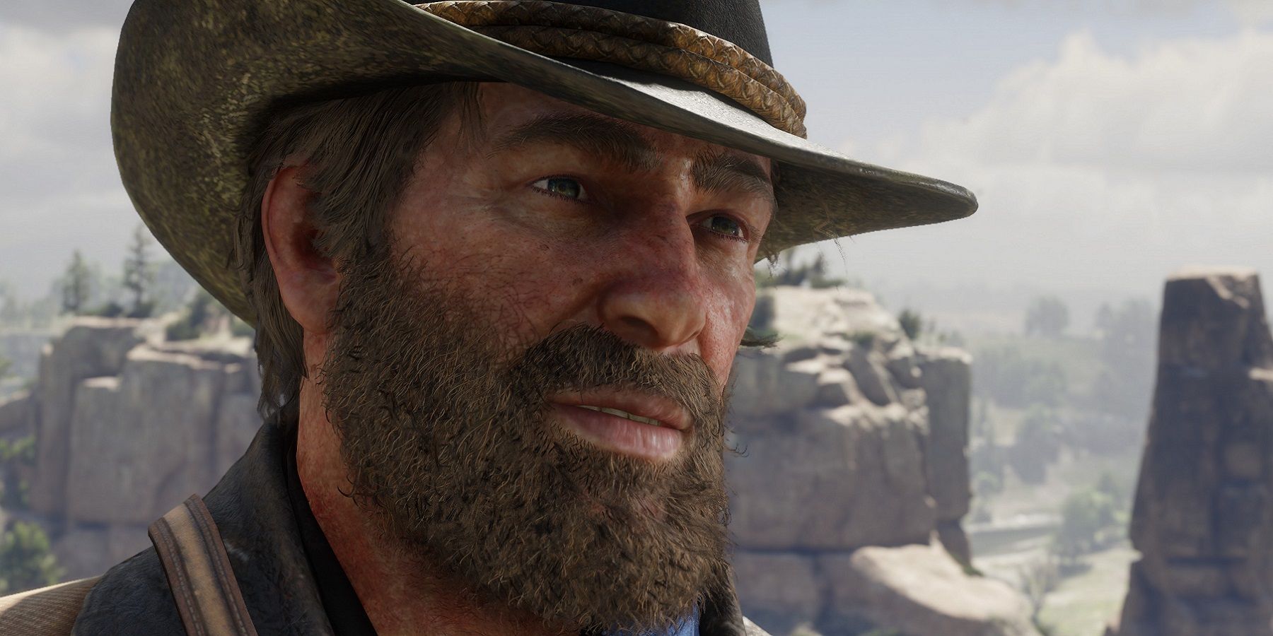 Image from Red Dead Redemption 2 showing a close-up of Arthur Morgan's face.