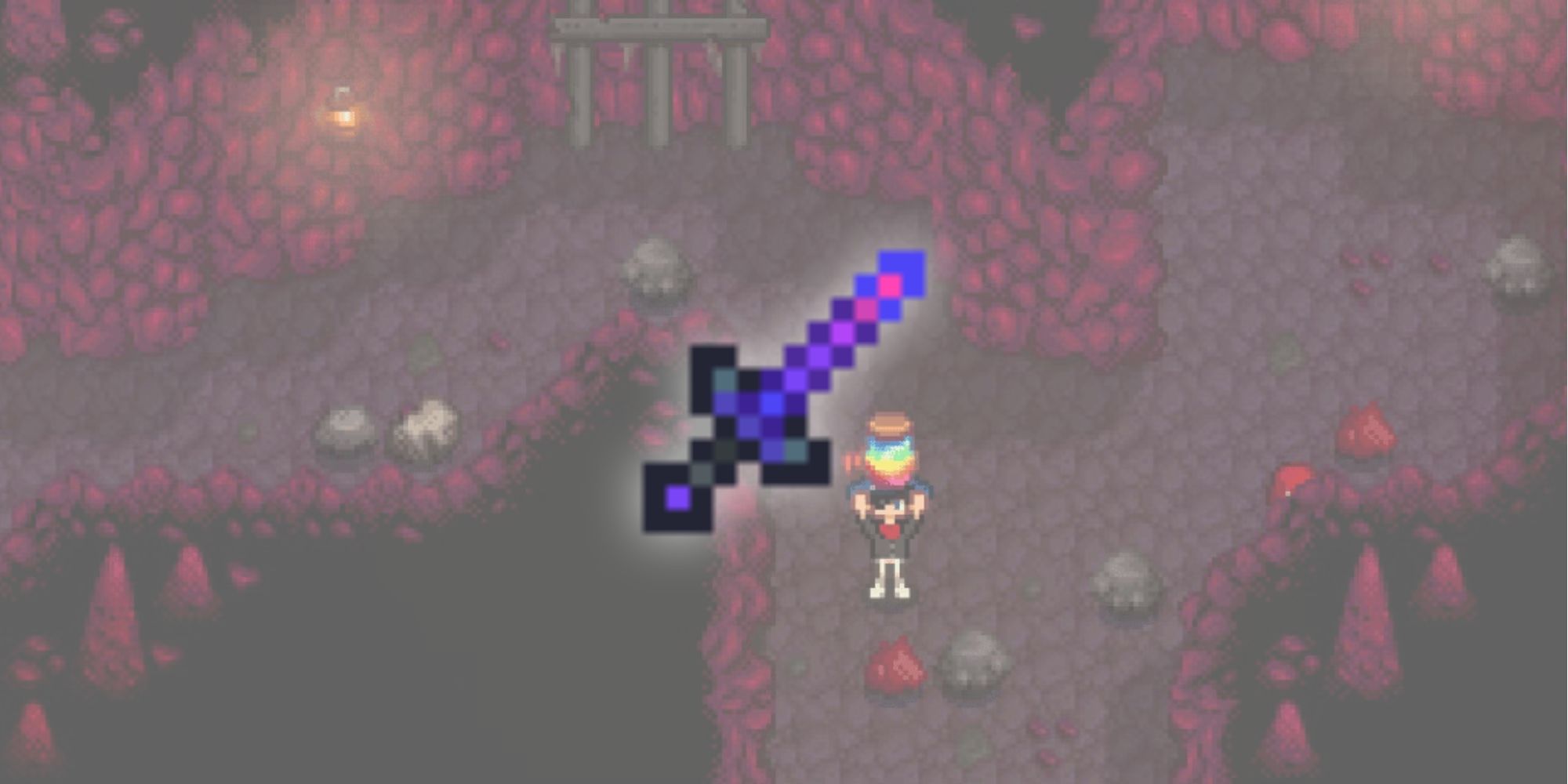 The Iridium Needle overlaid on top of a level of the mines for the list of best weapons in Stardew Valley.